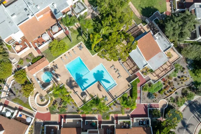 an aerial view of a city with lots of residential buildings