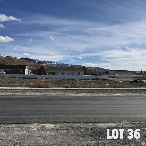 636 Cherry Ridge Lane, Unit 36 Richmond, UT 84333 - Photo 2 of 6 View of asphalt road featuring a mountain view