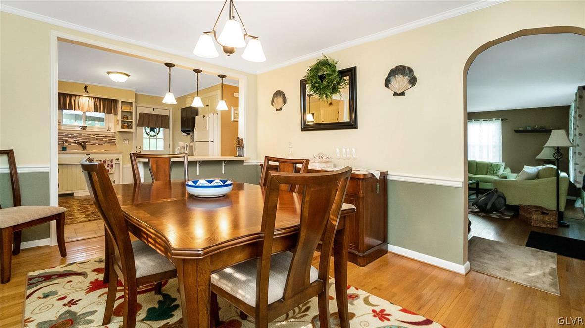2341 Highland Street Reading, PA 19609 - Photo 12 of 36 a view of a dining room with furniture and a chandelier