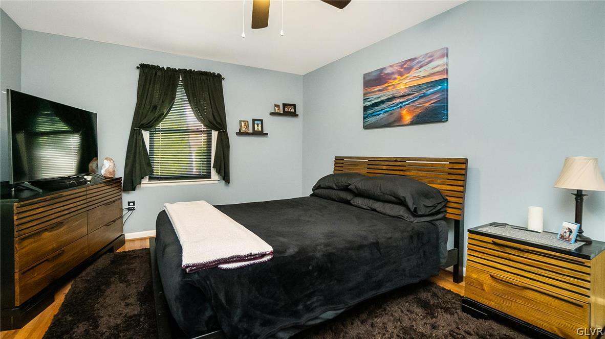 2341 Highland Street Reading, PA 19609 - Photo 15 of 36 a bedroom with a bed and a flat screen tv