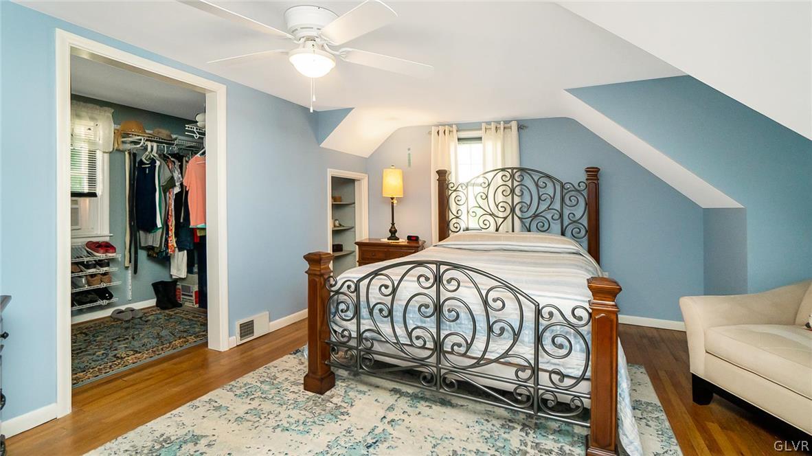 2341 Highland Street Reading, PA 19609 - Photo 20 of 36 a bedroom with a bed and a mirror