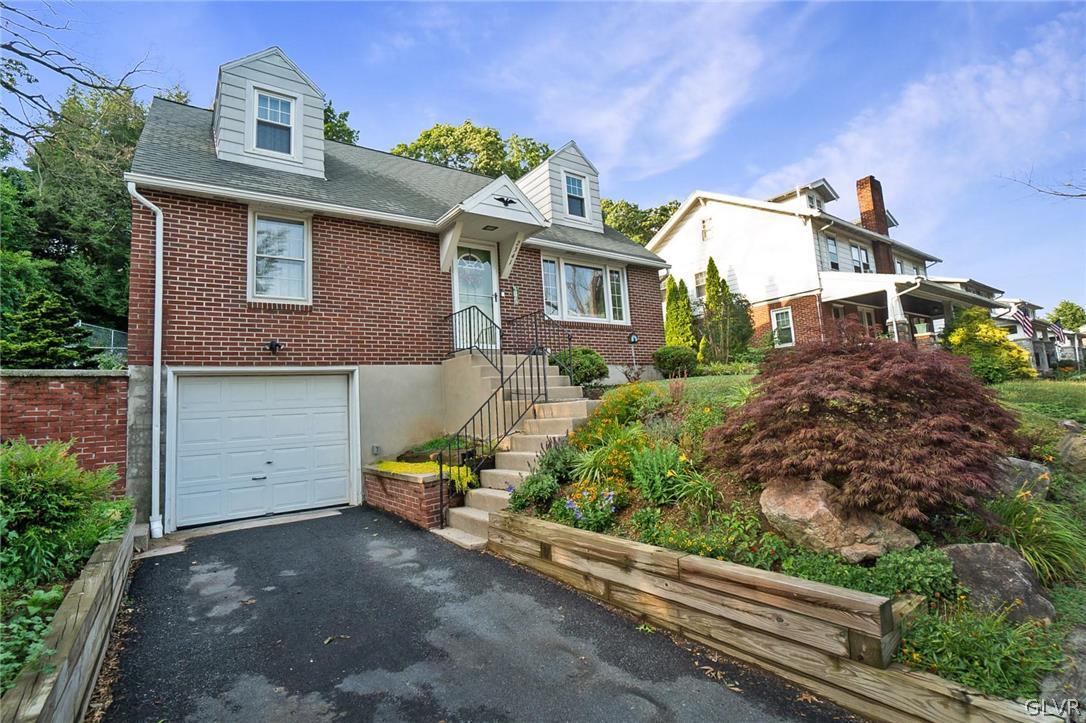 2341 Highland Street Reading, PA 19609 - Photo 2 of 36 front view of a house with a small yard