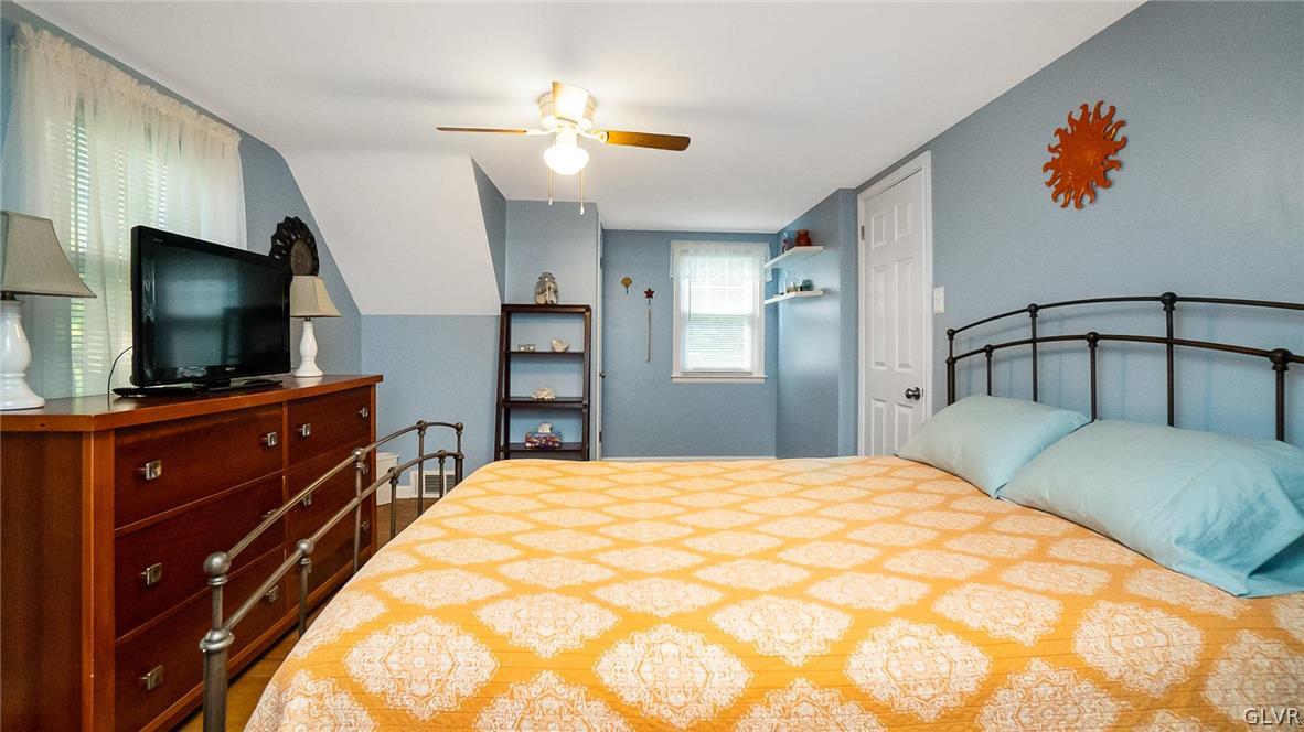 2341 Highland Street Reading, PA 19609 - Photo 22 of 36 a bedroom with a bed and a flat screen tv