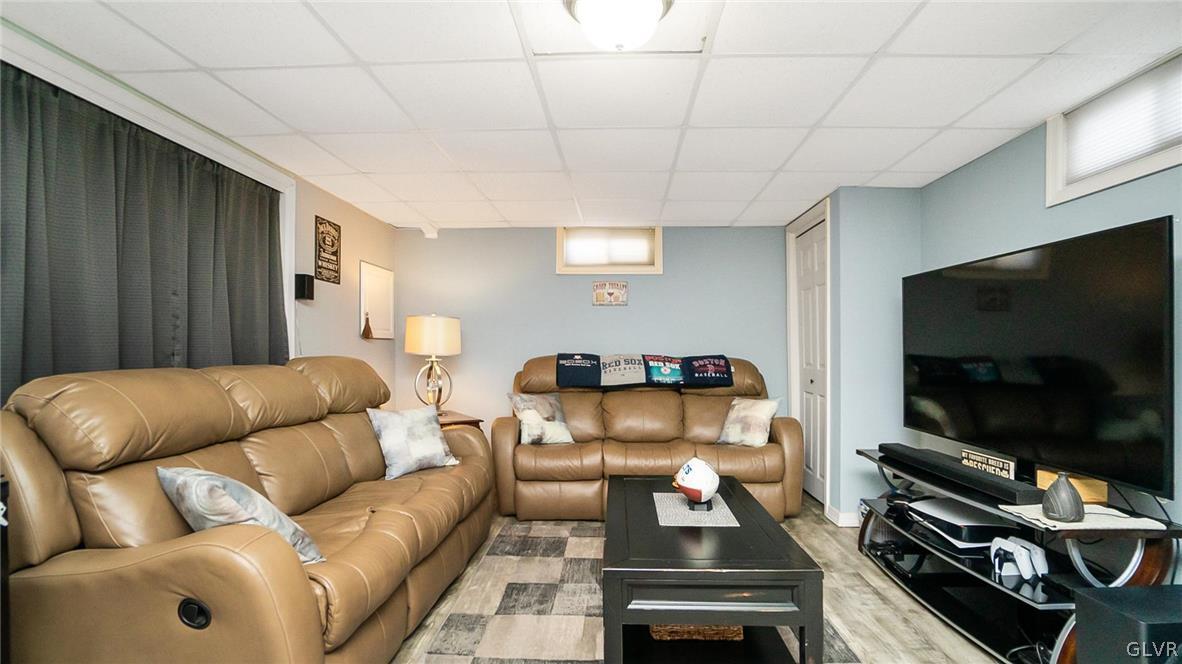 2341 Highland Street Reading, PA 19609 - Photo 26 of 36 a living room with furniture and a flat screen tv