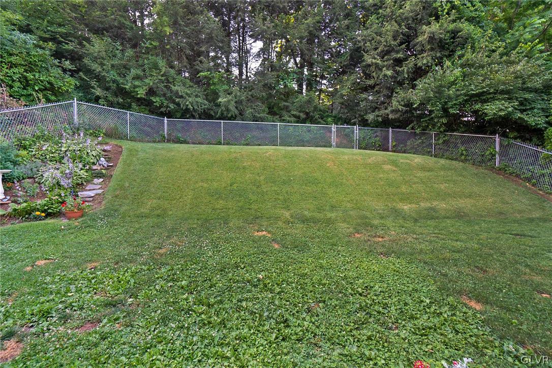 2341 Highland Street Reading, PA 19609 - Photo 32 of 36 a view of a backyard with a trampoline
