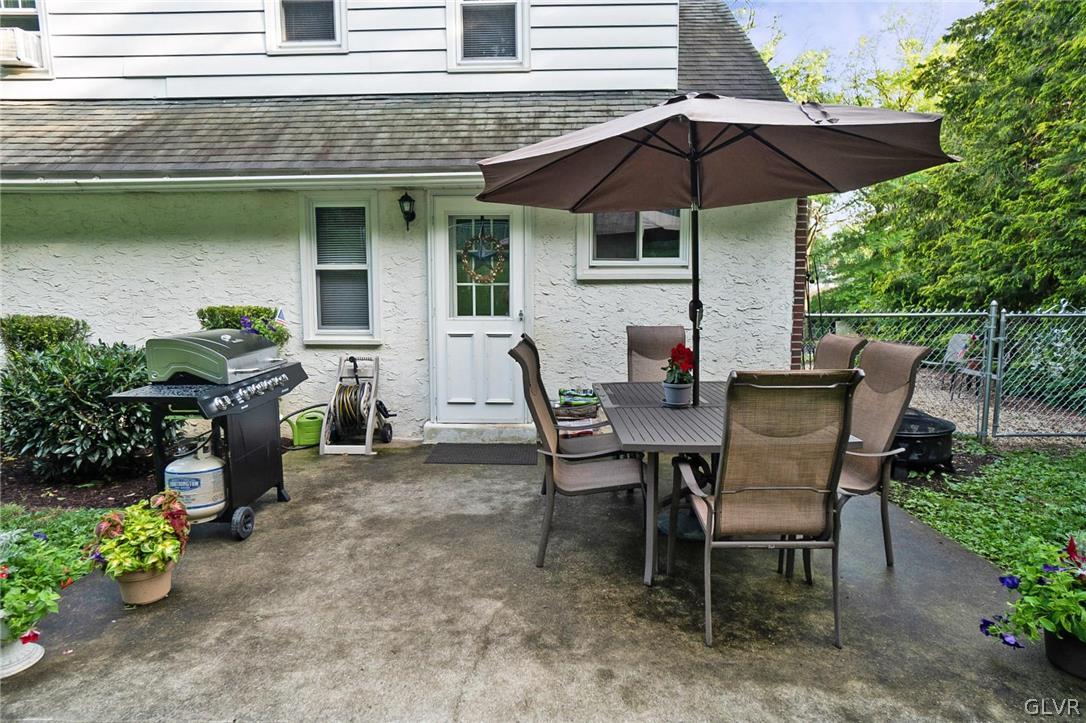 2341 Highland Street Reading, PA 19609 - Photo 34 of 36 a view of a table and chairs under an umbrella