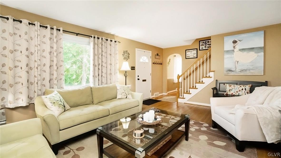 2341 Highland Street Reading, PA 19609 - Photo 5 of 36 a living room with furniture and a large window