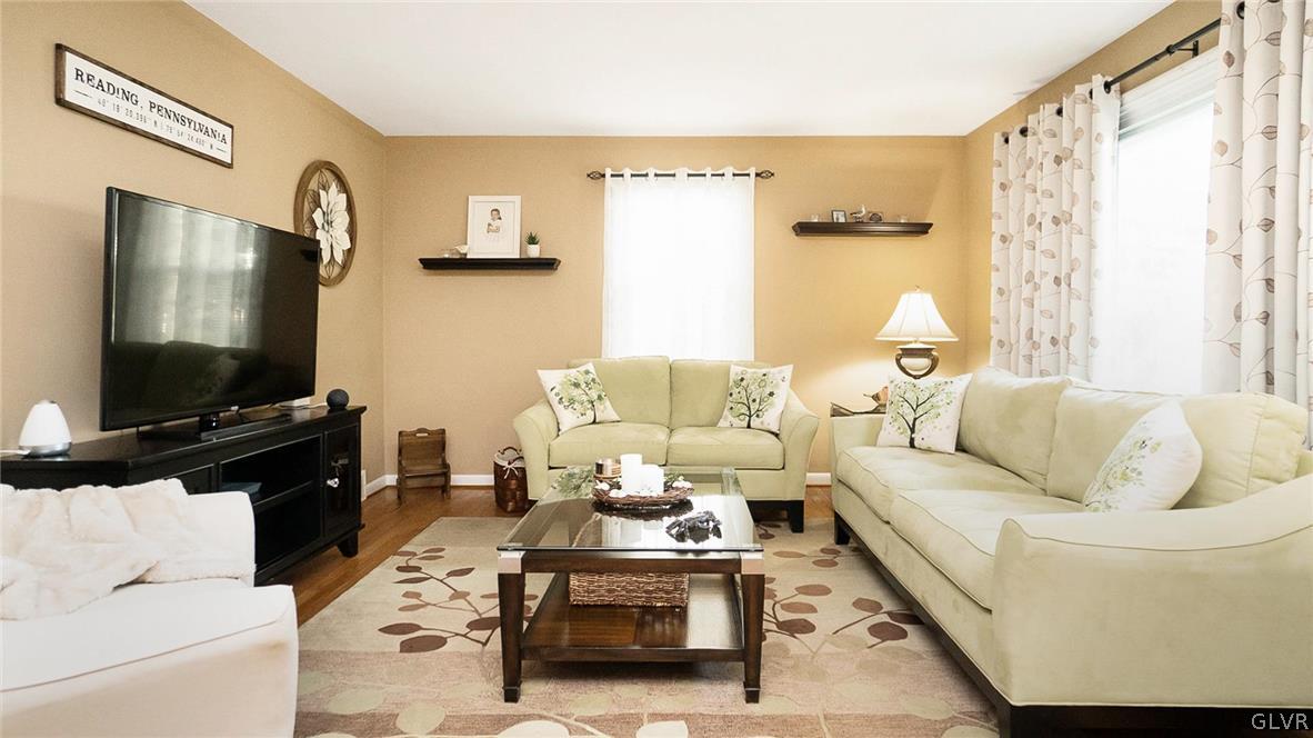 2341 Highland Street Reading, PA 19609 - Photo 6 of 36 a living room with furniture and a flat screen tv