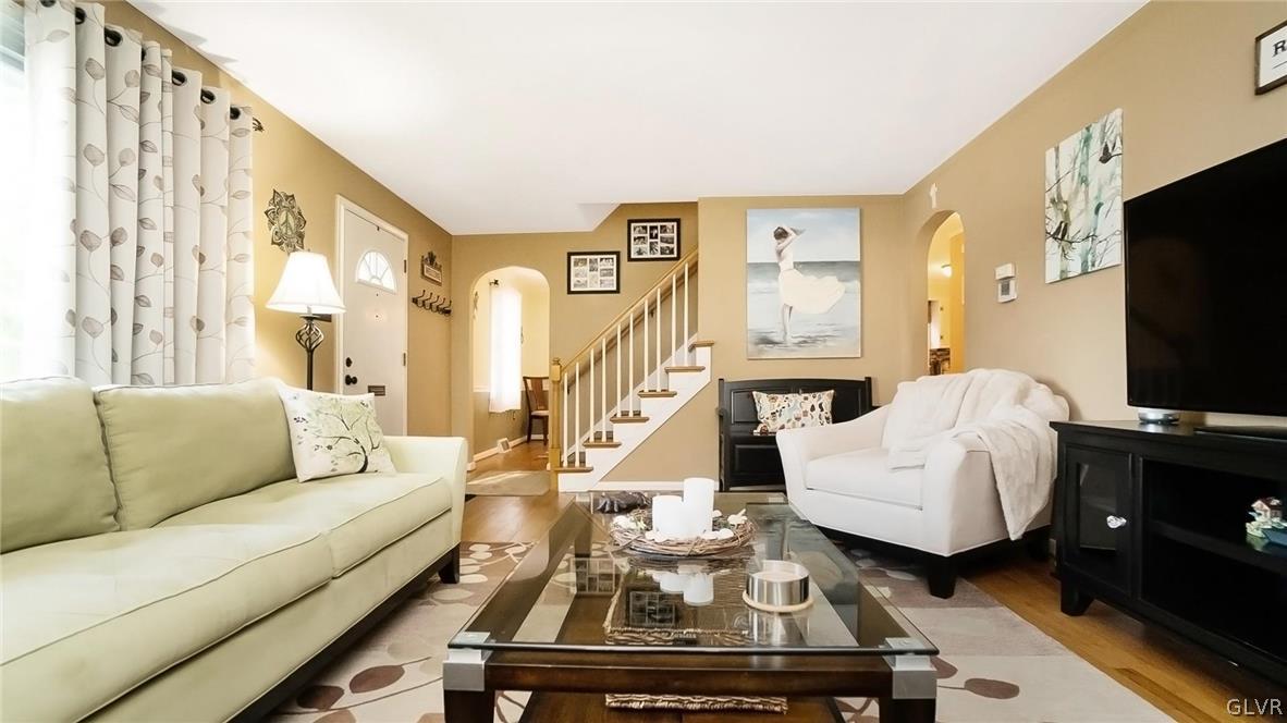 2341 Highland Street Reading, PA 19609 - Photo 7 of 36 a living room with furniture and a flat screen tv