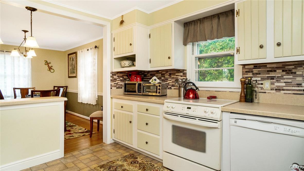 2341 Highland Street Reading, PA 19609 - Photo 8 of 36 a kitchen with white cabinets and white appliances