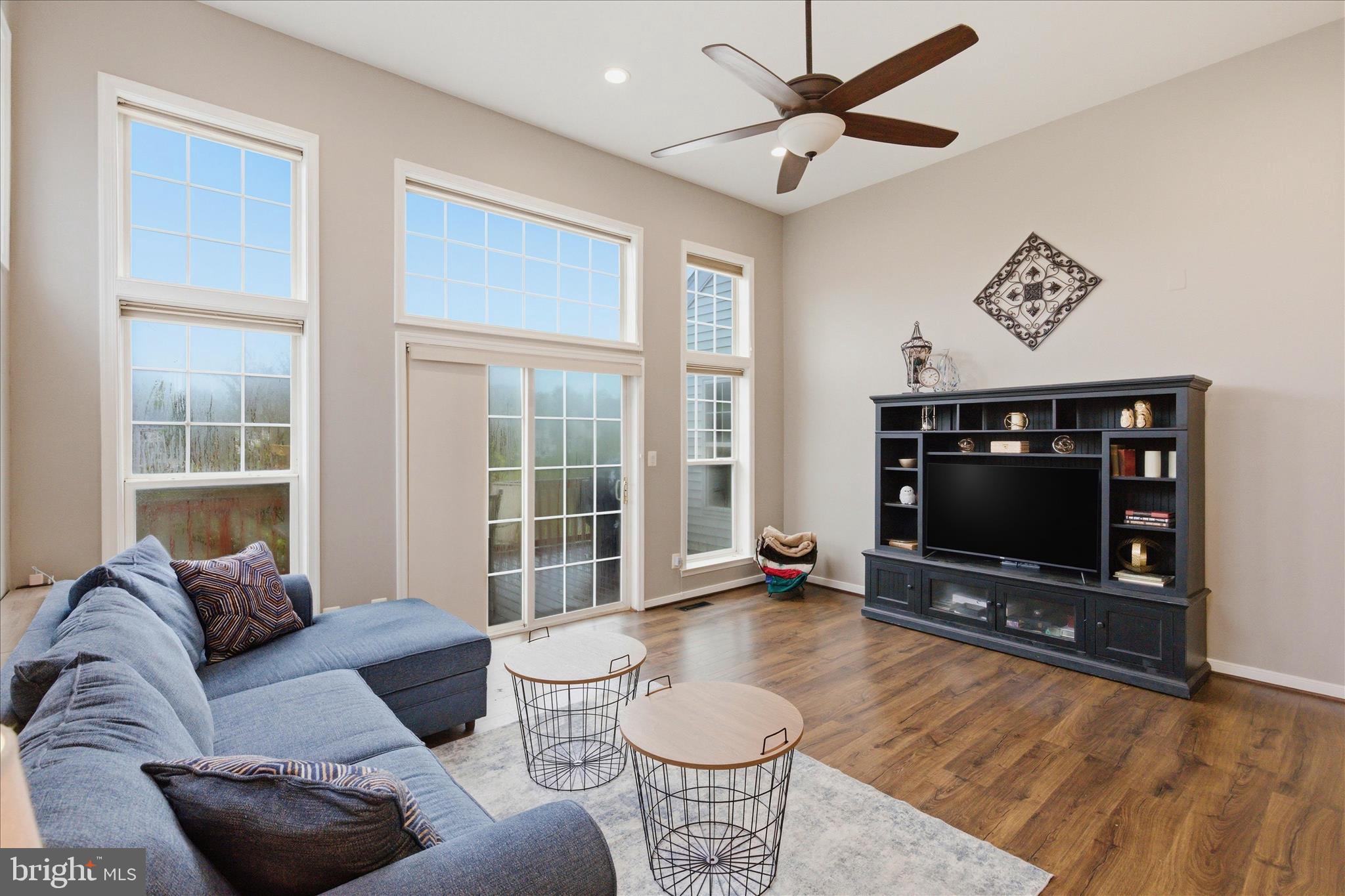 43605 Wembley Lane Chantilly, VA 20152 - Photo 7 of 41 Family Room w/ high ceilings overlooking pond