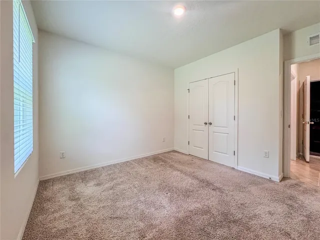 an empty room with an entryway