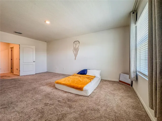 an empty room with natural light