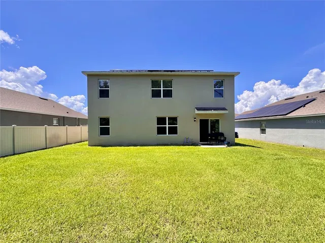 a house view with a outdoor space