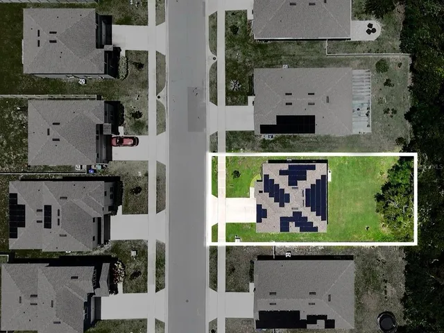 an aerial view of multiple houses