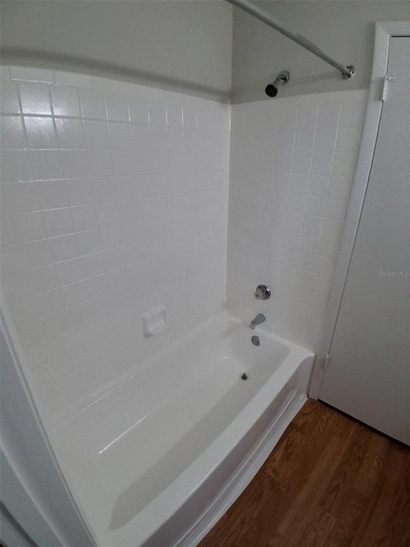 208 Afton Square, Unit 201 Altamonte Springs, FL 32714 - Photo 23 of 38 a bathroom with a bathtub and shower