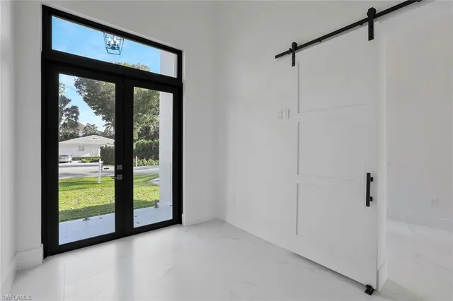 $2,995,000 | 1317 Cypress Woods Drive, Naples, FL 34103