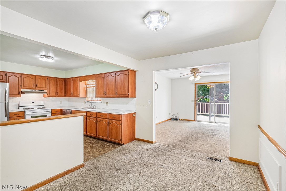 2758 Shellhart Road Norton, OH 44203 - Photo 8 of 41 Dining room looking into kitchen and family room