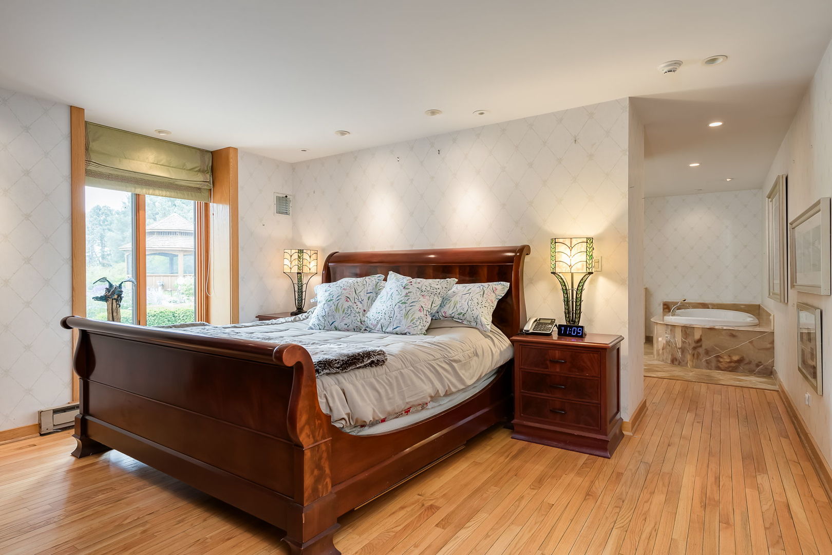 29295 North Callahan Road Wauconda, IL 60084 - Photo 33 of 45 a bed room with a bed and a night stand