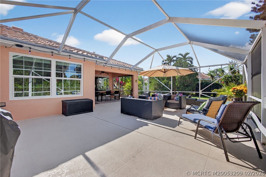 1035 Southwest Tamarrow Place Stuart, FL 34997 - Photo 29 of 46 Plenty of room for entertaining in this spacious screened lanai