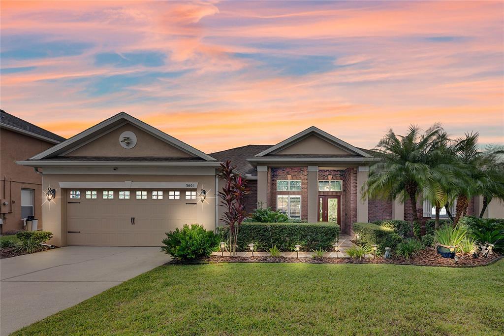 3601 Pawleys Loop South St. Cloud, FL 34769 - Photo 1 of 1 front view of a house with a yard