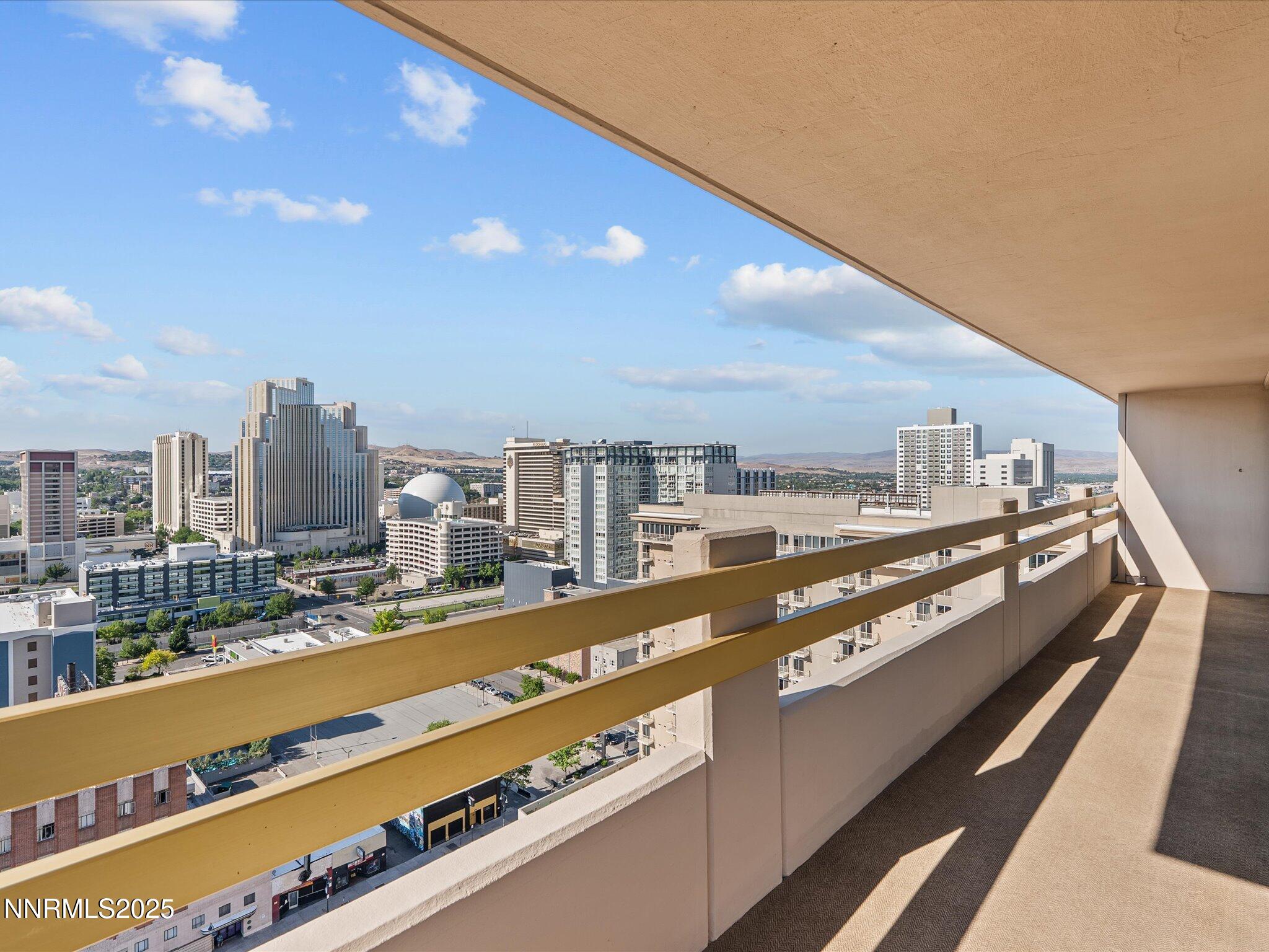 100 North Arlington Avenue, Unit 20J Reno, NV 89501 - Photo 3 of 17 a view of city and an outdoor space