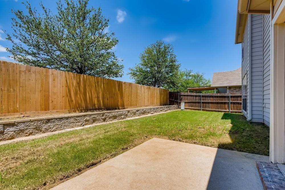 9937 Appletree Way Fort Worth, TX 76244 - Photo 24 of 25 a view of backyard with wooden fence