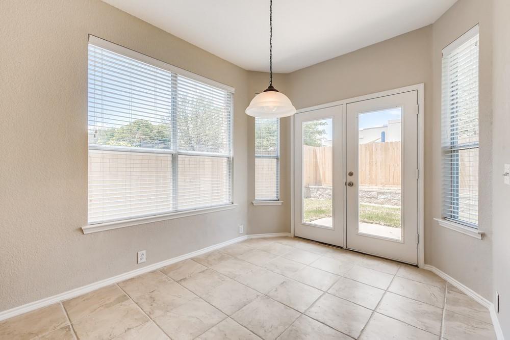 9937 Appletree Way Fort Worth, TX 76244 - Photo 8 of 25 a view of an empty room with a window