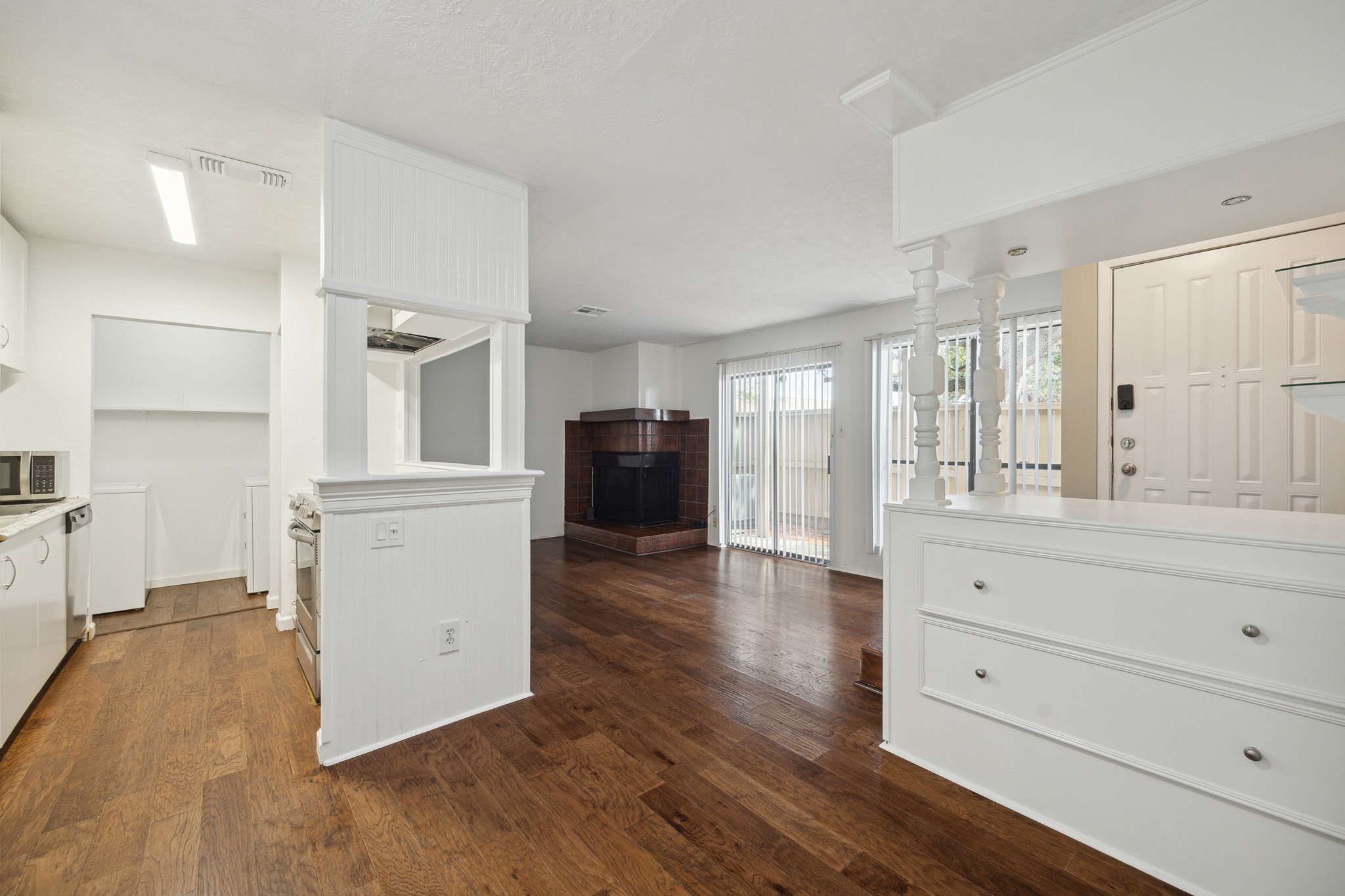 3606 Ocee Street Houston, TX 77063 - Photo 3 of 16 a view of a kitchen with wooden floor