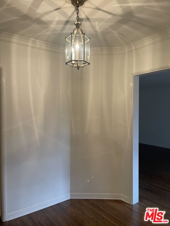 1292 Devon Avenue, Unit 1294 Los Angeles, CA 90024 - Photo 7 of 12 a view of empty room with wooden floor and fan