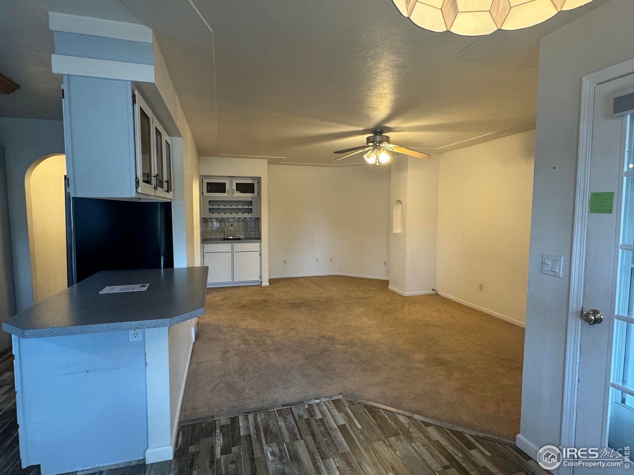 4927 West 6th Street Greeley, CO 80634 - Photo 12 of 34 a view of a livingroom with furniture and a flat screen tv