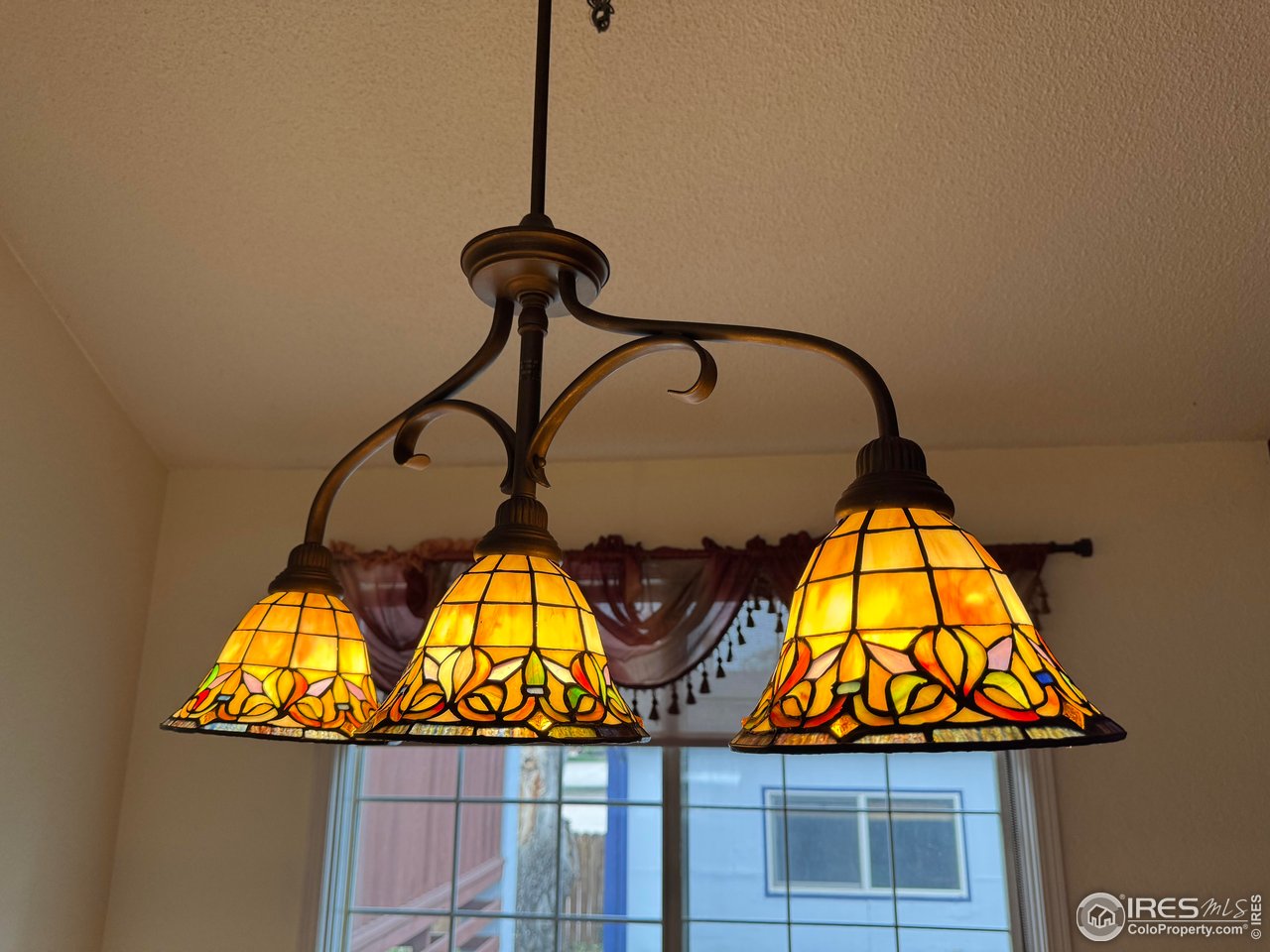 4927 West 6th Street Greeley, CO 80634 - Photo 13 of 34 a picture of a bathroom with a sink and mirror