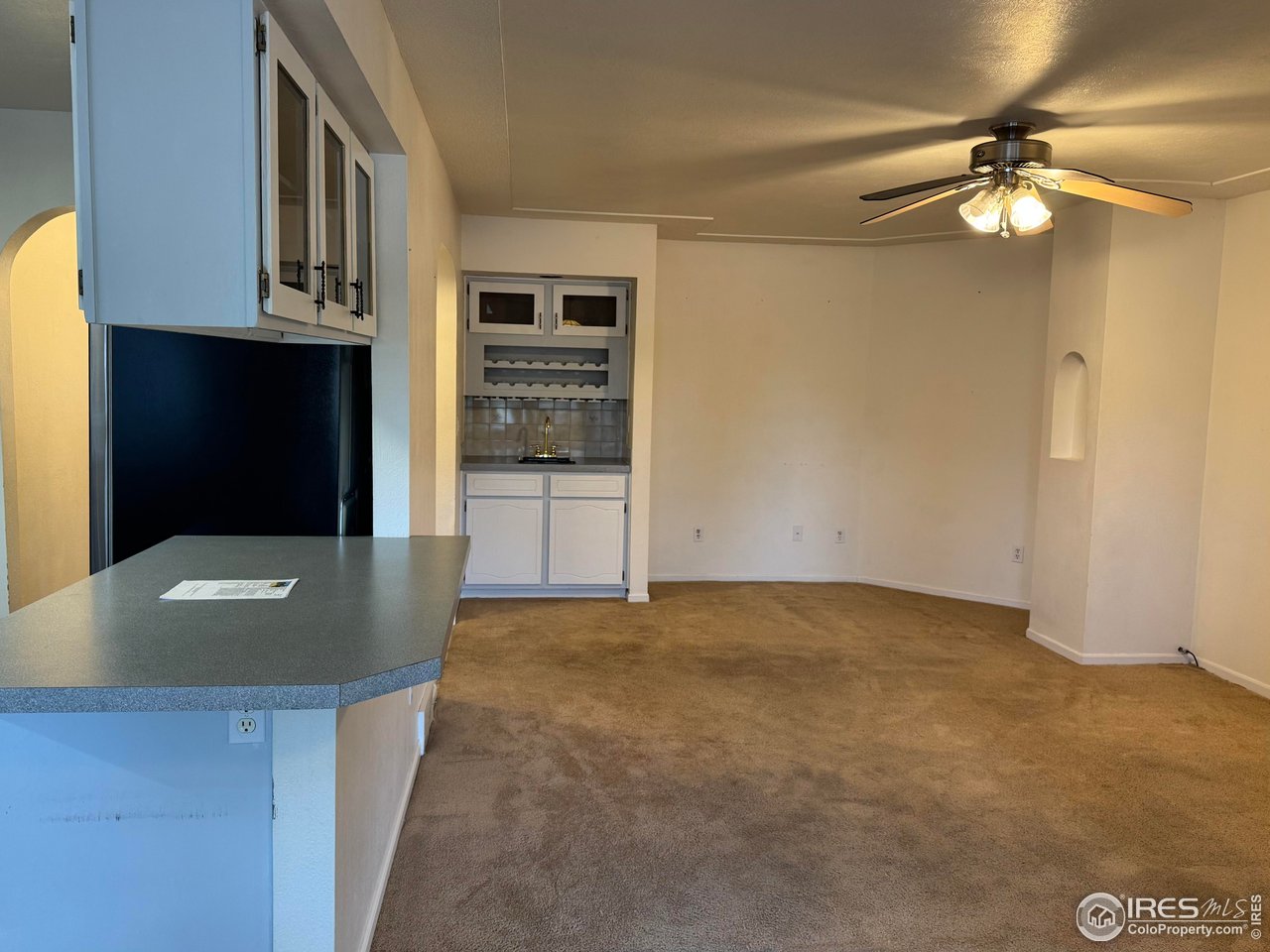 4927 West 6th Street Greeley, CO 80634 - Photo 16 of 34 a view of an empty room with a fireplace