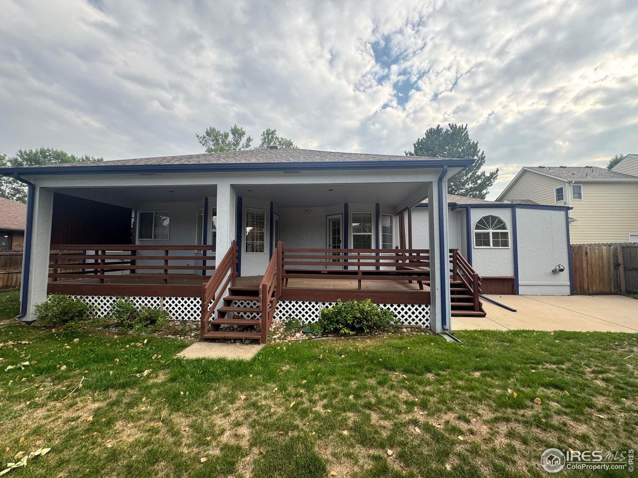 4927 West 6th Street Greeley, CO 80634 - Photo 19 of 34 a front view of a house with a yard