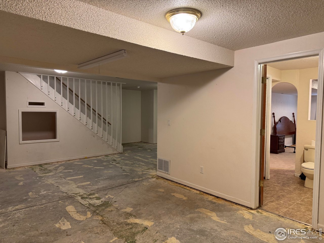 4927 West 6th Street Greeley, CO 80634 - Photo 24 of 34 a view of a hallway view with staircase