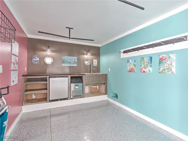 a room with lots of wooden cabinets