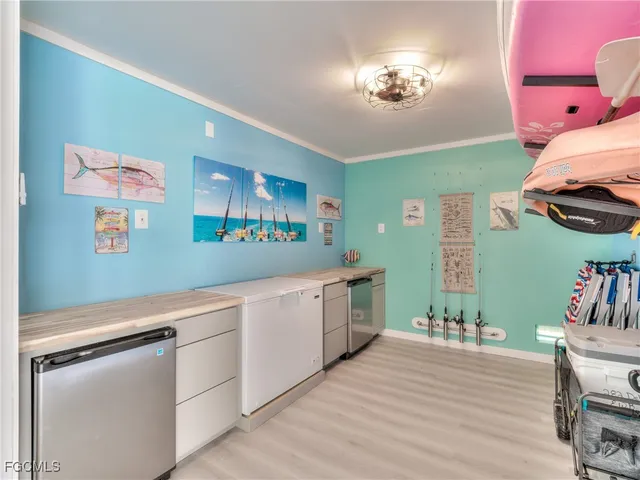 a room with furniture and a chandelier