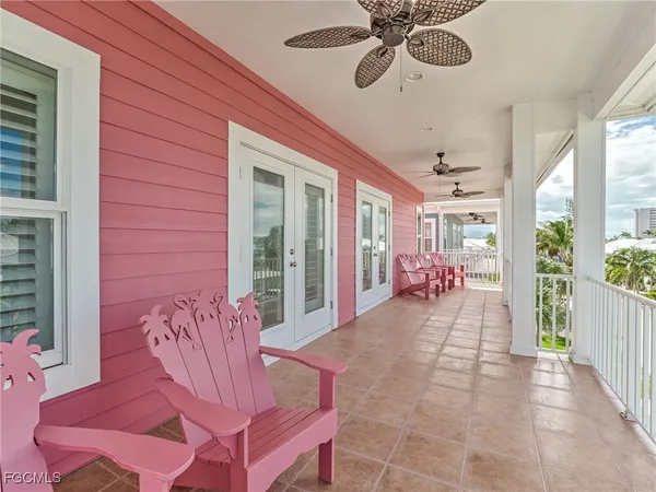 a view of a porch with furniture