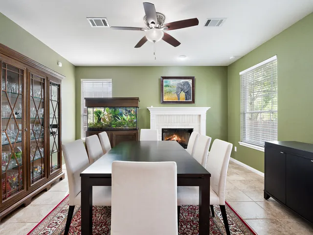 a view of a dining room with furniture window and outside view