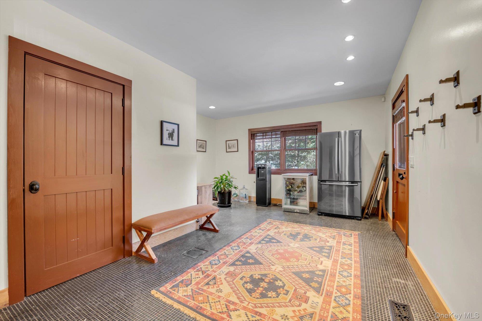 254 Adams Road Hewlett Harbor, NY 11557 - Photo 12 of 34 a living room with furniture and a rug