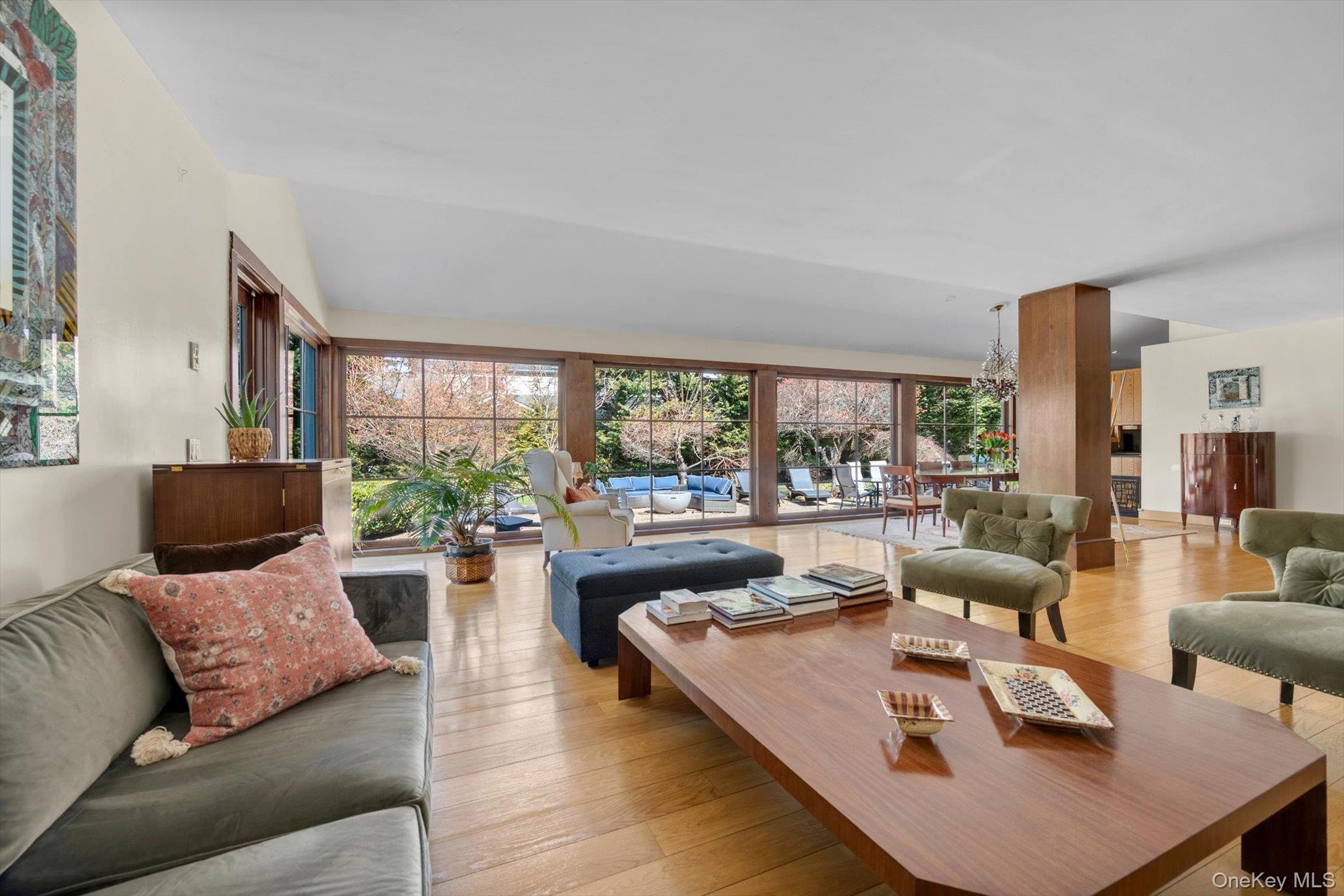 254 Adams Road Hewlett Harbor, NY 11557 - Photo 4 of 34 a living room with furniture and a large window