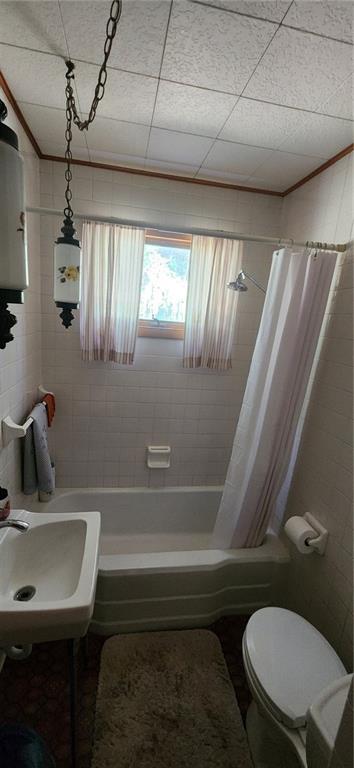 1677 Mercer Road Ellwood City, PA 16117 - Photo 13 of 22 a bathroom with a sink a toilet a mirror and vanity