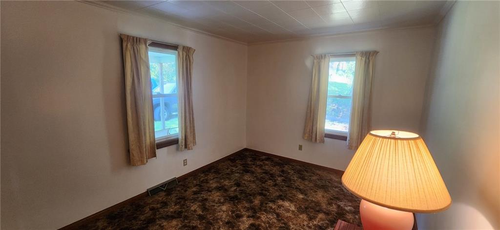 1677 Mercer Road Ellwood City, PA 16117 - Photo 17 of 22 an entryway with bed and a window