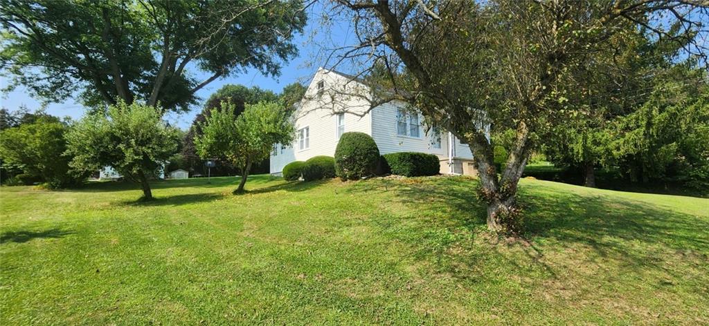 1677 Mercer Road Ellwood City, PA 16117 - Photo 5 of 22 a view of a backyard