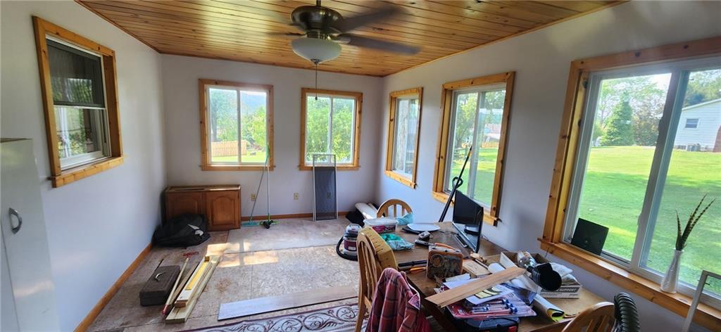 1677 Mercer Road Ellwood City, PA 16117 - Photo 10 of 22 a room with furniture equipment and a large window