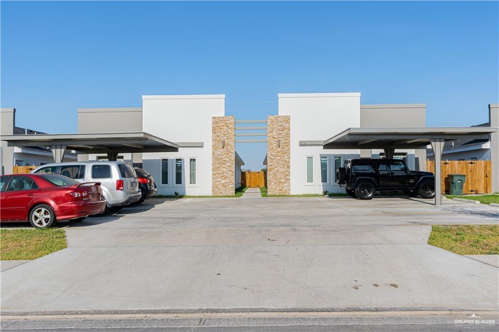 405 Rafael Drive, Unit 2 San Juan, TX 78589 - Photo 1 of 9 a car parked in front of a building