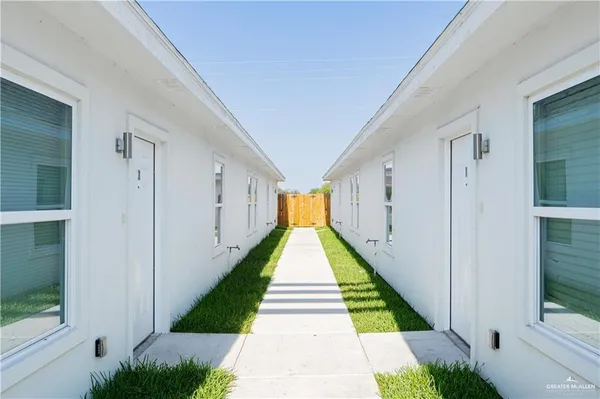 a view of swimming pool with a balcony