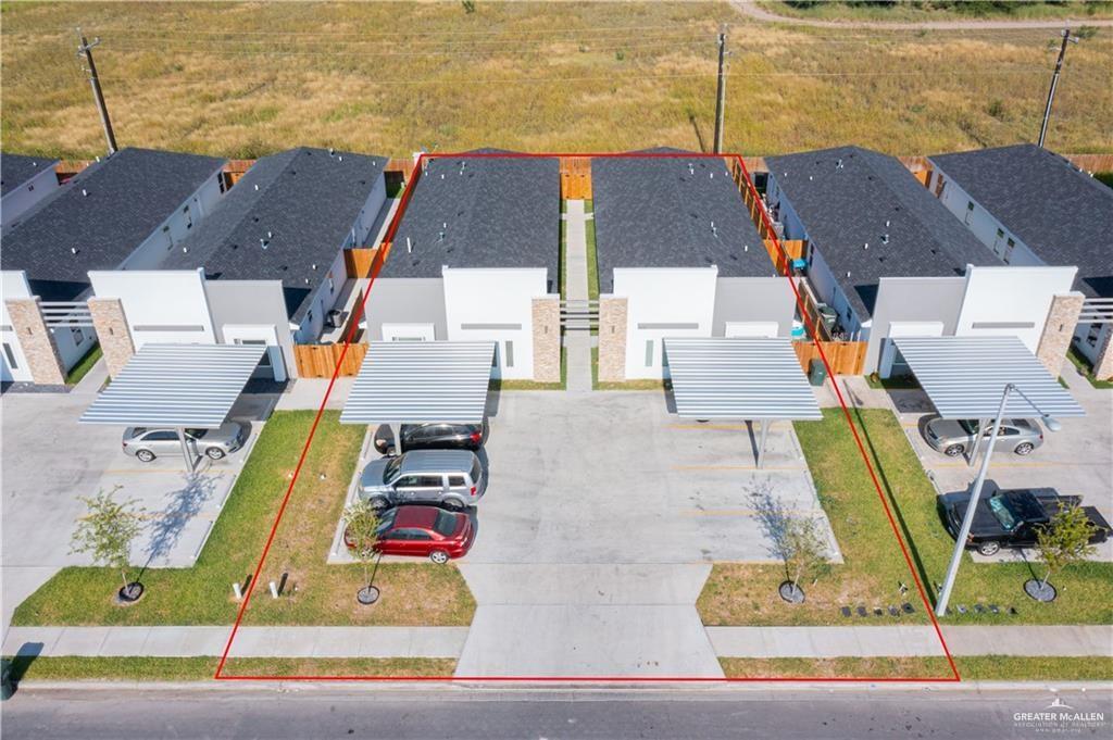 405 Rafael Drive, Unit 2 San Juan, TX 78589 - Photo 9 of 9 an aerial view of residential houses with outdoor space