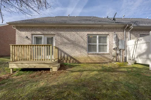 a house view with a garden space