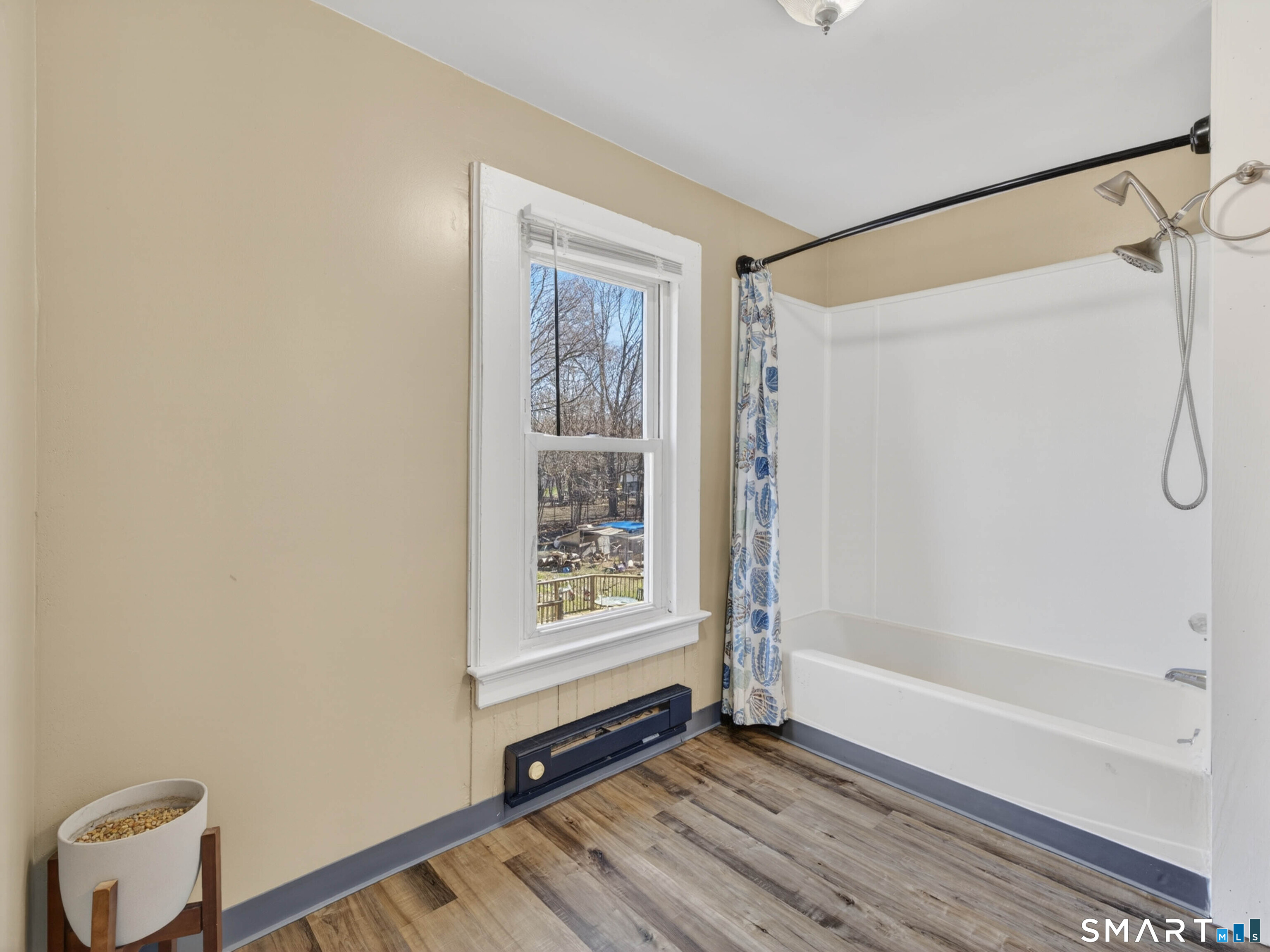 97 Woodland Street Meriden, CT 06451 - Photo 14 of 35 a view of an empty room with a window